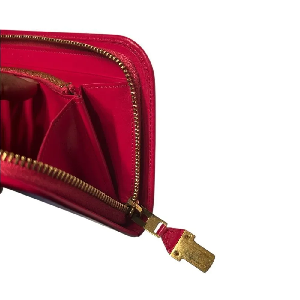 Authentic Saint Laurent Pink Zippy Wallet